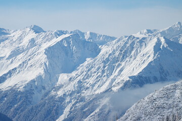 Fototapeta na wymiar Snowy mountains in Innsbruck Alps in winter