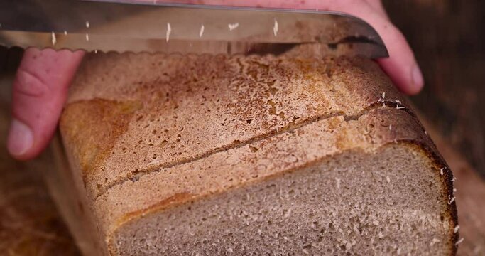 rectangular fresh and soft bread on the table, a loaf of wheat and rye flour bread on the table