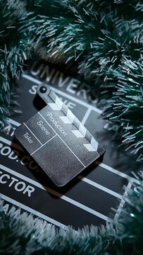 vertical footage of clapper board hand tinsel