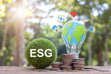 Green ball that writes the word ESG with ESG icon concept for environmental, social, and governance...
