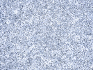 Fototapeta na wymiar Winter abstract background. Snowflake pattern on a blue background. Macro texture. Natural background. View from above. 