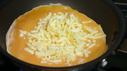 How to make a cheese omelette roll with a runny center, perfect for a serving of risotto