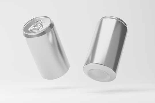 Falling blank aluminum soda cans isolated over white background. Mockup template. 3d rendering.