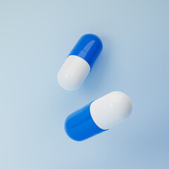 Falling blue and white antibiotic pill capsules isolated over blue background. Healthcare and medical concept. 3D rendering.