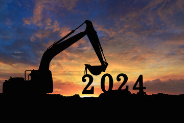 Concept happy new year 2024,crawler excavator silhouette with lift up bucket  the number two .On...