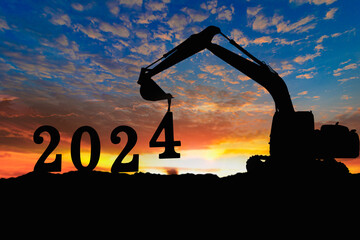Concept happy new year 2024,crawler excavator silhouette with lift up bucket the number four .On sunrise backgrounds