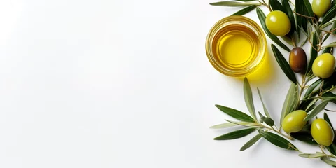 Fotobehang  Frame background of fresh green olives with leaf and olive oil with copy space for text  © Umar