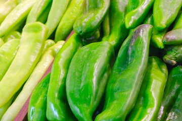 Fresh hot green peppers in the market
