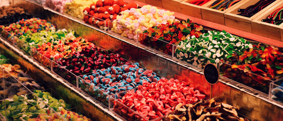 Colorful candies on display at a market stall in Budapest, Hungary.