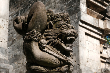 Demon at the entrance to the Uluwatu Temple. Bali, Indonesia.