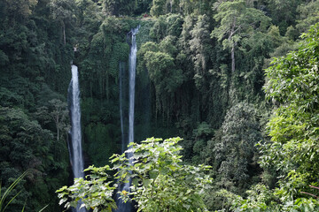 View of Sekumpul waterfall on sunny day. Bali, Indonesia.