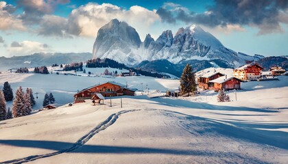 gorgeous morning view of alpe di siusi village stunning winter landscape of dolomite alps majestic outdoor scene of ski resort ityaly europe beauty of nature concept background - obrazy, fototapety, plakaty