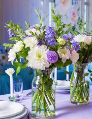 Beautiful spring flowers bouquets in glass vases on festive table