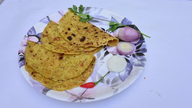 Mooli paratha or Radish flatbread. Healthy Indian Mooli paratha. Daikon flatbread. It is a popular food of india. It can be eaten for breakfast, lunch and dinner. Indian food. 
