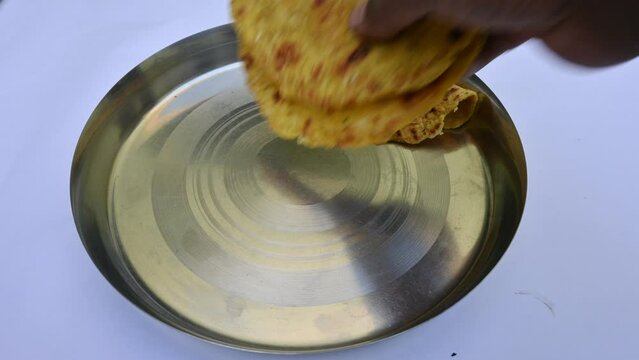 Mooli paratha or Radish flatbread. Healthy Indian Mooli paratha. Daikon flatbread. It is a popular food of india. It can be eaten for breakfast, lunch and dinner. Indian food. 
