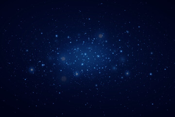 Realistic starry sky with blue glow of light. Bright stars with reflections in the dark sky.