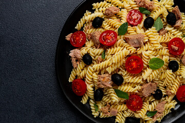 Tuna salad, fusilli pasta, olives and cherry, olive oil, homemade,
