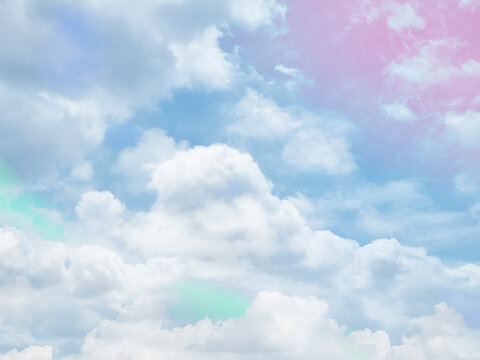 beauty abstract sweet pastel soft green and blue with fluffy clouds on sky. multi color rainbow image. fantasy growing light