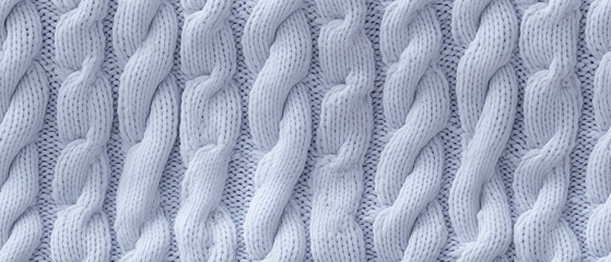 Fototapeta na wymiar Close-up of intricate white knitted sweater pattern.