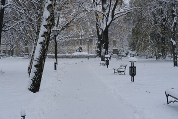 A public park of Krakow center under the snow. Krakow, Poland - December 2, 2023.