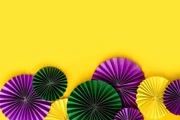 Zelfklevend Fotobehang Mardi Gras.Colorful group of Mardi Gras or venetian mask on yellow,Mardi gras carnival decoration beads yellow background. © shintartanya