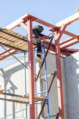 Welder works at height, welder's work