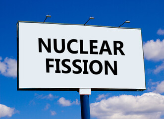 Nuclear fission symbol. Concept words Nuclear fission on beautiful big white billboard. Beautiful...