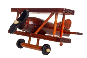 Wooden toy airplane for children's games, vintage retro style, isolated on white background