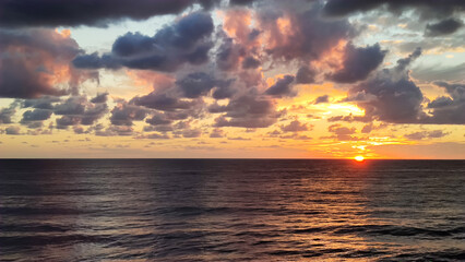 Seascape with beautiful sunset and clouds