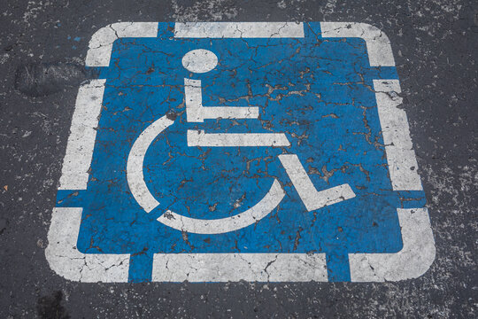 Handicapped parking spot - transportation infrastructure road markings