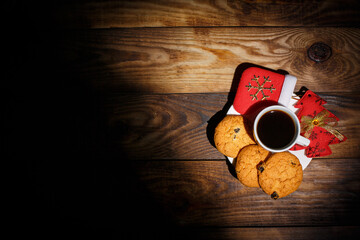 Background with different New Year's toys and chocolate cookies, New Year and Christmas