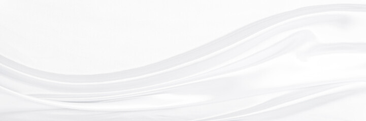 White gray satin texture that is white silver fabric silk panorama background with beautiful soft blur pattern natural.