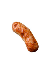 Delicious juicy grilled sausage with pasta or noodles with salt, spices and herbs