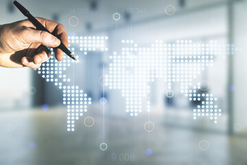 Multi exposure of businessman hand with pen working with abstract graphic world map on blurred office background, big data and networking concept