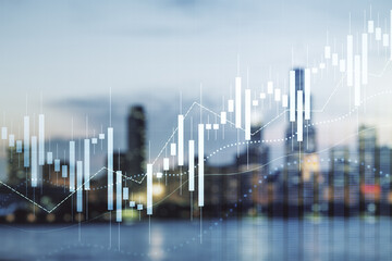 Double exposure of abstract creative financial chart hologram on blurry cityscape background, research and strategy concept