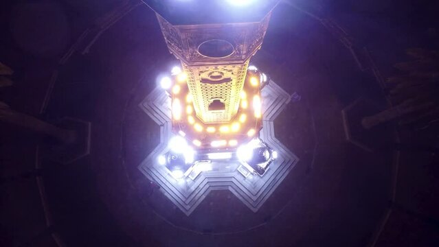 Illuminated night vertical drone view of Izmir clock tower
