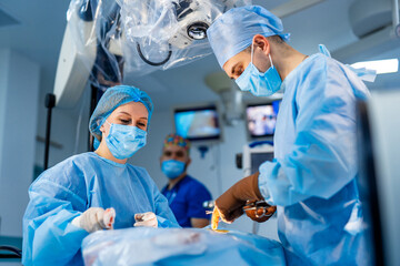 Healthcare surgical technologies. Professional surgeon working in emergency room.