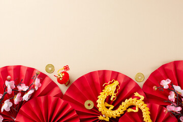 Let's rejoice and celebrate Chinese New Year. Top view flat lay of gold dragon, red paper fans,...