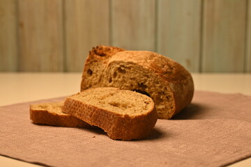 sliced ​​white bread in pieces on a gray background