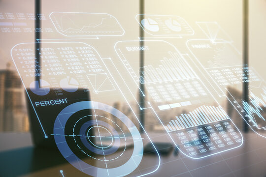 Multi exposure of stats data illustration and modern desktop with computer on background, computing and analytics concept