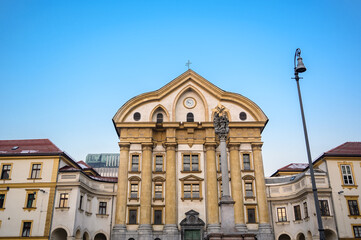 Fototapeta na wymiar Ursuline Holy Trinity church on Congress square in Ljubljana