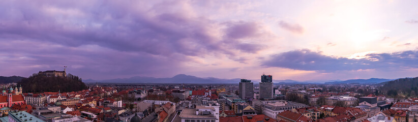 Fototapeta premium Panoramic wide angle aerial view over the the city of Ljubljana during sunset