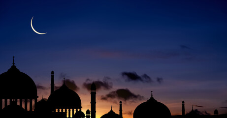 Islamic Background, Silhouette Mosques Dome,Crescent Moon on Dusk Sky Twilight,Landscape Sunset...