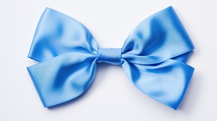  a close up of a blue bow on top of a white surface with a light blue ribbon on the side of the bow.