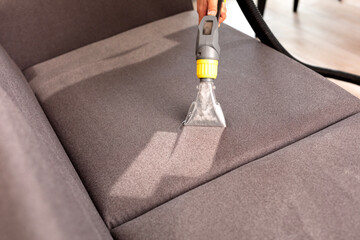 Sofa or armchair chemical cleaning with professionally extraction method. - obrazy, fototapety, plakaty