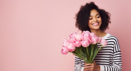 woman holding bouquet of tulips