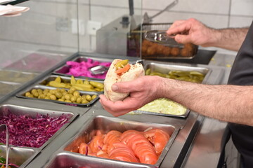 Preparing Falafel Pita with a Fresh Salad Bar – Hands-on Culinary Experience