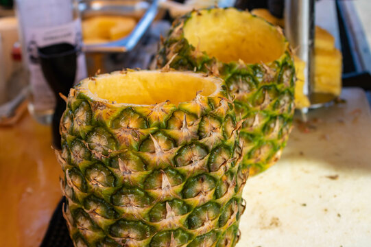 Two hollowed out pineapples ready for coctails