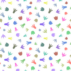 Dinosaur foot prints seamless pattern. Cute dino's foot prints  children illustration. Isolated colorful silhouettes