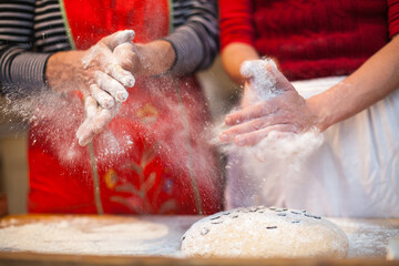 Adult Women Hands Preparing Dough for Bread at Home
